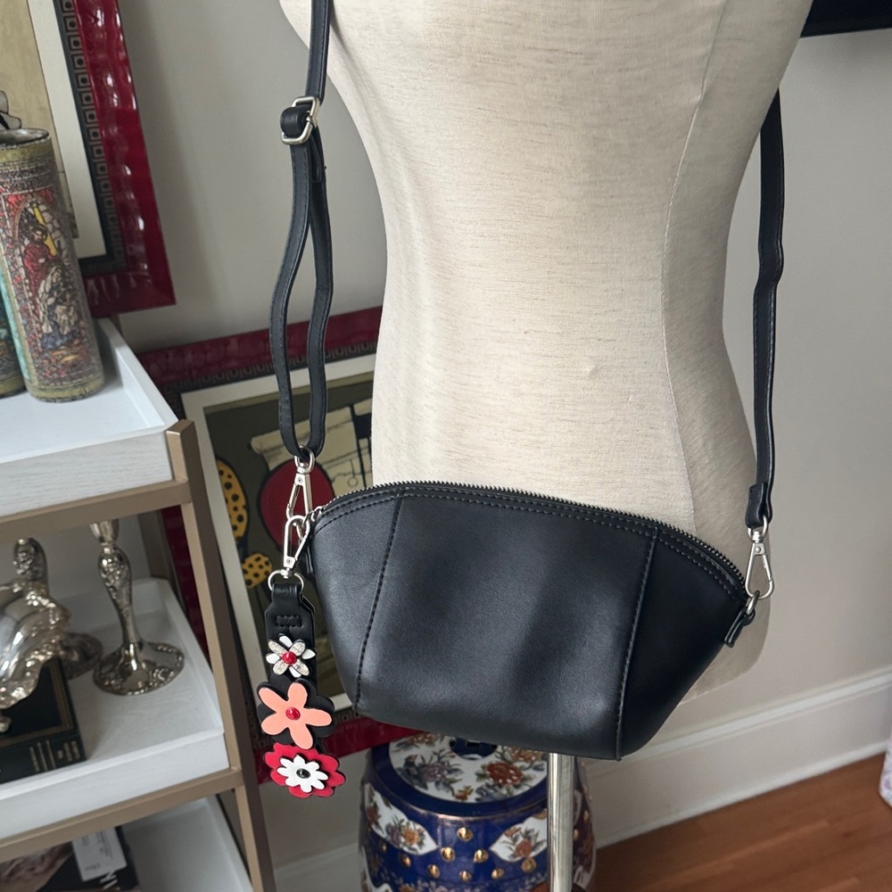 Elegant Black Crossbody Bag with Floral Accents